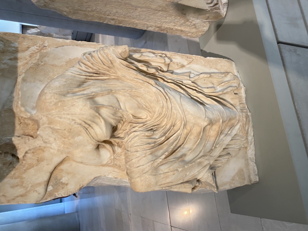 Nike Adjusting Her Sandal relief, Acropolis Museum, Athens